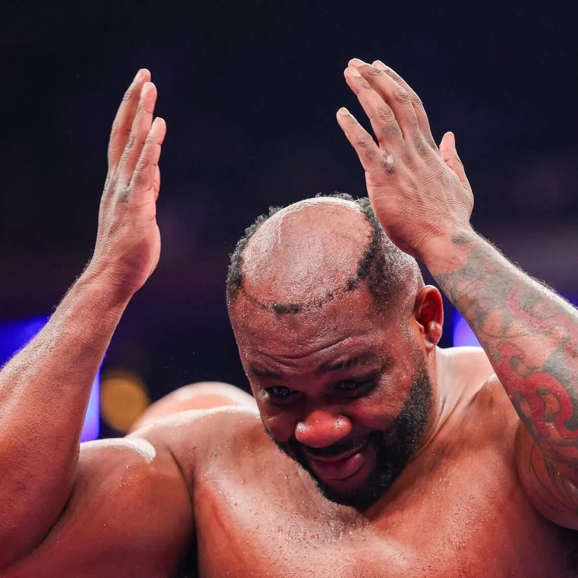 Jarrell Miller reacts to his toupee falling off in a heavyweight bout against Kingsley Ibeh at Madison Square Garden on Jan 31.