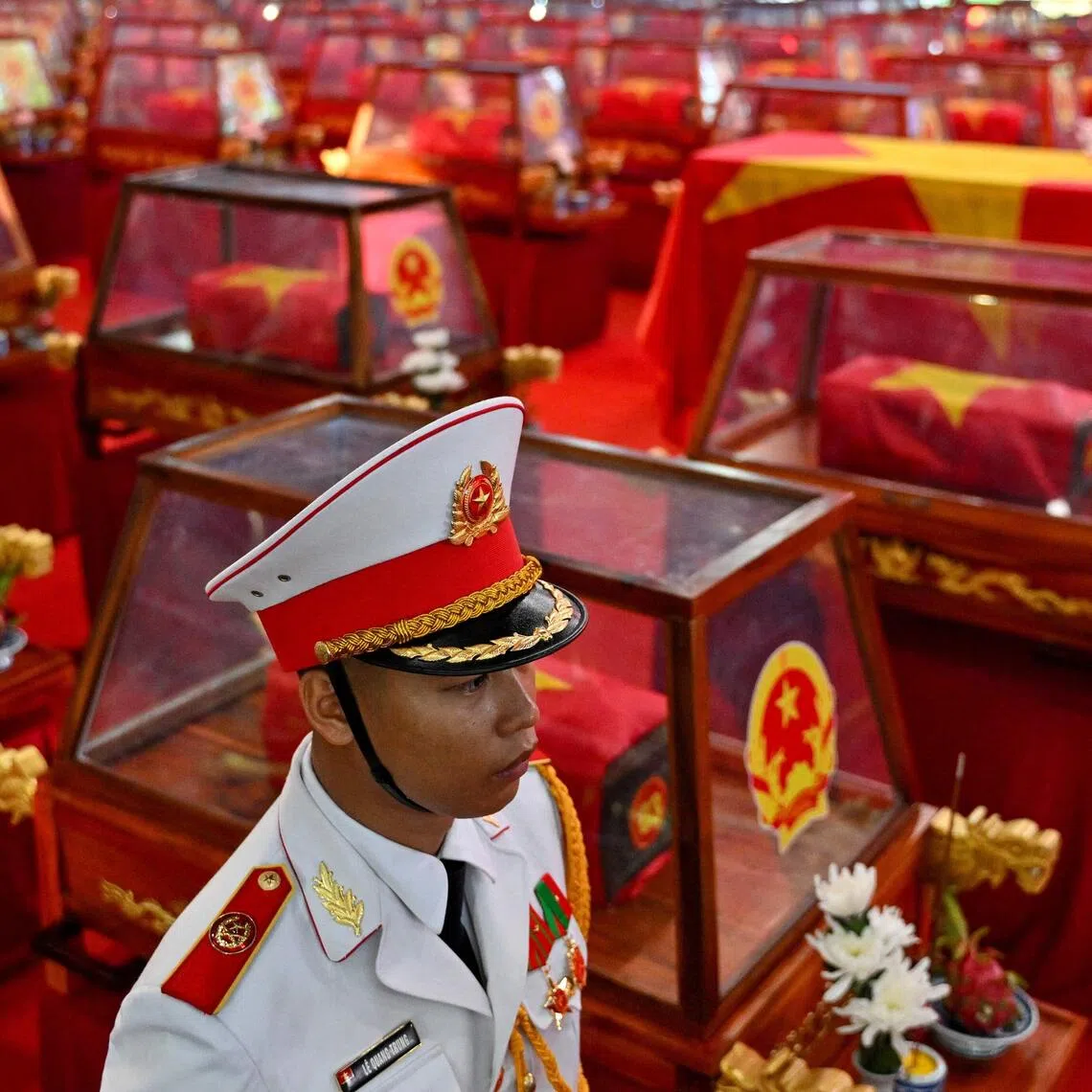 Caskets containing the remains of fallen soldiers at Le Thi Rieng Park in Ho Chi Minh City on Oct 14.