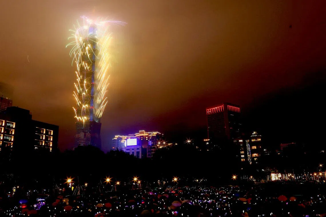 Fireworks shot off Taiwan's tallest high-rise Taipei 101 to celebrate the arrival of 2023 in Taipei, Taiwan, Jan 1, 2023. 