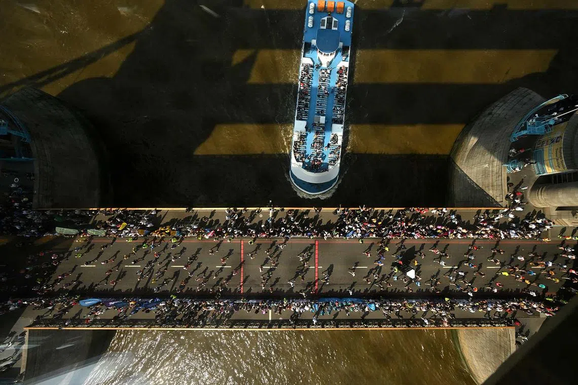 A view of runners on Tower Bridge during the London Marathon, April 27, 2025. 