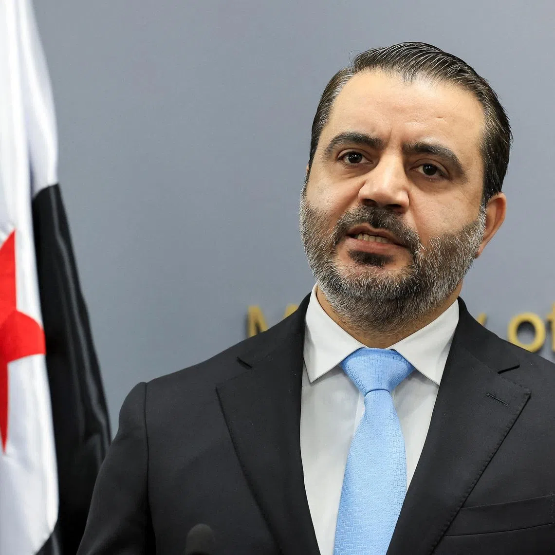 FILE PHOTO: Syrian Foreign Minister Asaad Al-Shibani attends a press conference at the Lebanese foreign ministry, in Beirut, Lebanon, October 10, 2025. REUTERS/Mohamed Azakir/File Photo