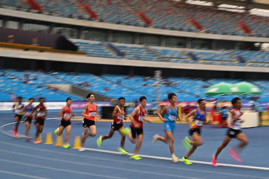 Soh Rui Yong (bib 242) taking part in the men's 5,000m final, where he finished fourth. But it was his sportsmanship in the 10,000m, where he handed water to Indonesia's Rikki Marthin Simbolon, that got people talking.