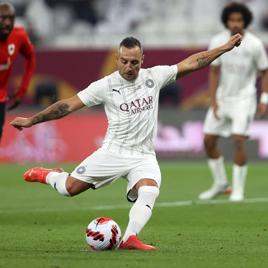 Soccer Football - Emir Cup - Final - Al Sadd v Al Rayyan - Al Thumama Stadium, Al Thumama, Qatar - October 22, 2021 Al Sadd's Santi Cazorla scores their first goal from the penalty spot REUTERS/Ibraheem Al Omari