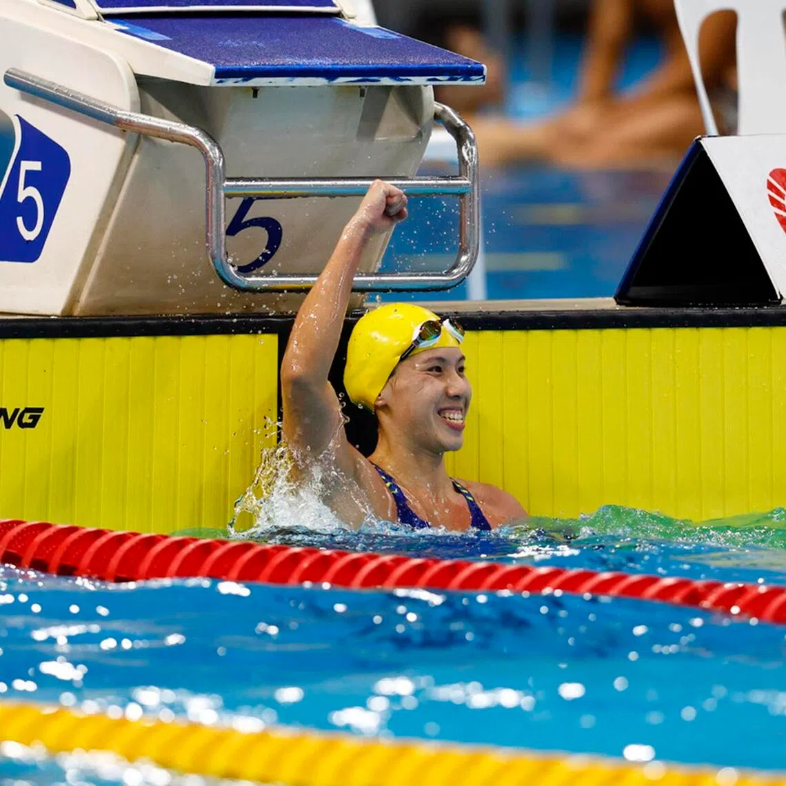 Singapore's Amanda Lim celebrates after winning the women's 50m freestyle in record time at the 2026 Singapore National Swimming Championships at the OCBC Aquatic Centre.
