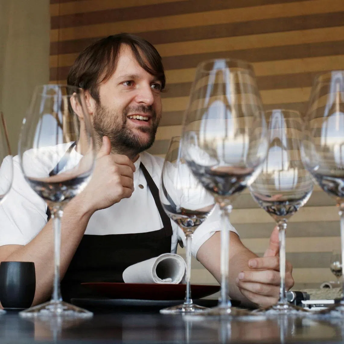 FILE PHOTO: Rene Redzepi, the head chef of Noma in Copenhagen, talks during an interview with Reuters at Noma at Mandarin Oriental Tokyo February 10, 2015. REUTERS/Yuya Shino/File Photo