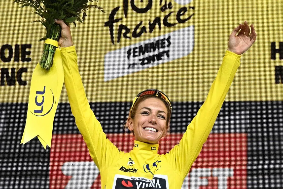 French rider Pauline Ferrand-Prevot celebrates on the podium for the fourth edition of the Women’s Tour de France on Aug 3, 2025.