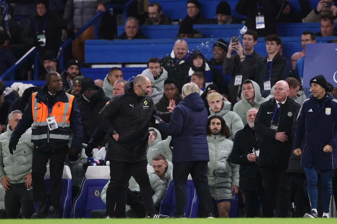Soccer Football - Premier League - Chelsea v Aston Villa - Stamford Bridge, London, Britain - December 27, 2025  Bottle of water is thrown towards direction of the Aston Villa bench at the end of the match. REUTERS/David Klein