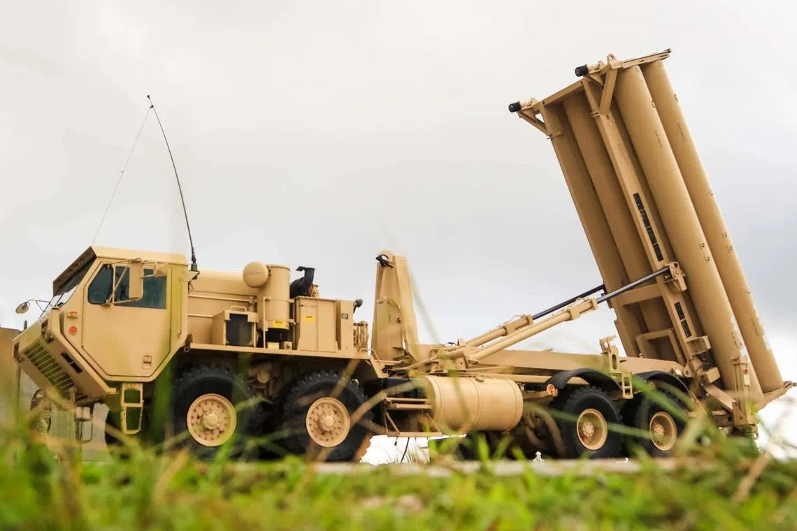 FILE PHOTO: A U.S. Army Terminal High Altitude Area Defense (THAAD) weapon system is seen on Andersen Air Force Base, Guam, October 26, 2017.  U.S. Army/Capt. Adan Cazarez/Handout via REUTERS/File Photo