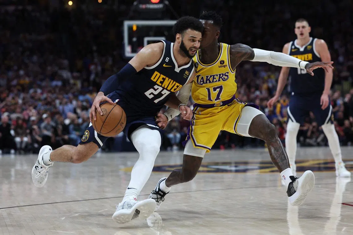 Jamal Murray of the Denver Nuggets drives against Dennis Schroder of the Los Angeles Lakers during Game 2 of their Western Conference Finals.