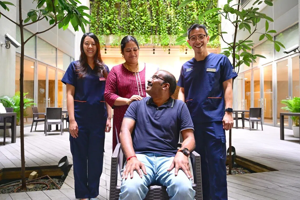 Dr Melissa Tay and Associate Professor Tiong Ho Yee from NUH, who performed the surgery, with Mr Kathavarayan Dhinakaran and his wife Arivunila Dhinakaran.