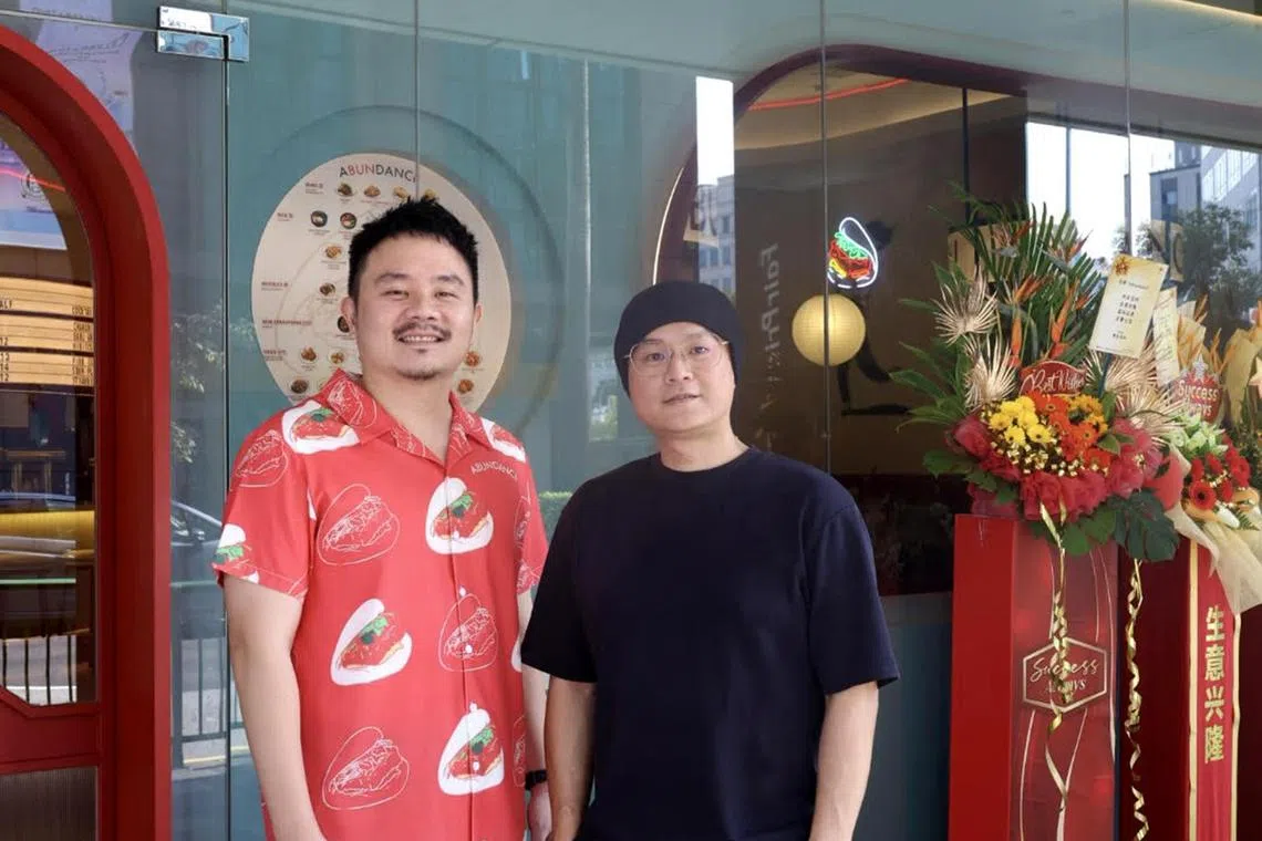 Left to right: Mr Tan Yuan Xin and Mr Jaz Yew who are co-founders of Taiwanese chain eatery Abundance. The pair at their newest and third outlet at Century Square in Tampines.