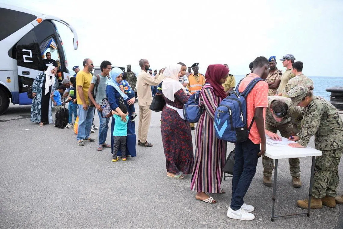 US nationals queue for evacuation in Port Sudan on April 30. 