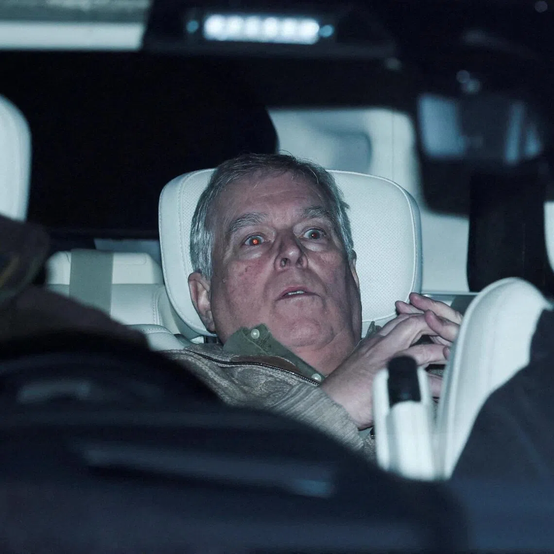 Mr Andrew Mountbatten Windsor - formerly known as Prince Andrew - leaving Aylsham Police Station in the British county of Norfolk on Feb 19, after a day of questioning by London detectives.