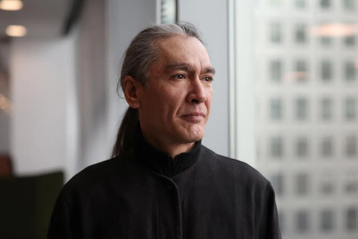 Kim Aris, the son of Aung San Suu Kyi, Myanmar's detained former leader, poses for a portrait at the Reuters office in London, Britain, April 18, 2024. REUTERS/Suzanne Plunkett