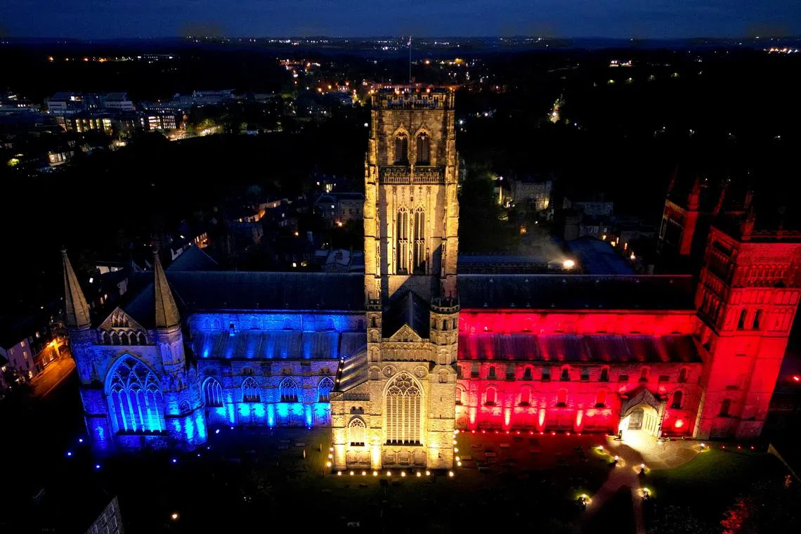 Durham Cathedral is lit up in the colours of the Union Jack ahead of coronation of King Charles in Durham, Britain, May 5.