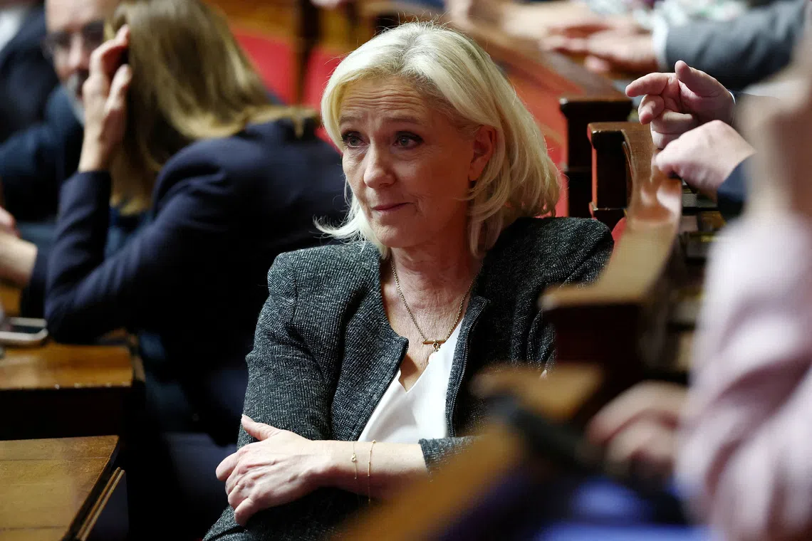 FILE PHOTO: French far-right leader and member of parliament Marine Le Pen, President of the French far-right National Rally (Rassemblement National - RN) party parliamentary group, is seen at the National Assembly in Paris, France, October 14, 2025. REUTERS/Gonzalo Fuentes/File Photo