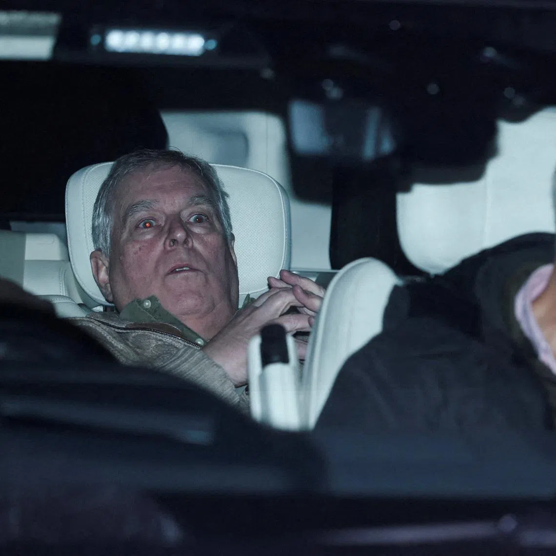 Britain's former prince Andrew leaving a police station in Aylsham, Britain, on Feb 19 after he was arrested on suspicion of misconduct in public office.