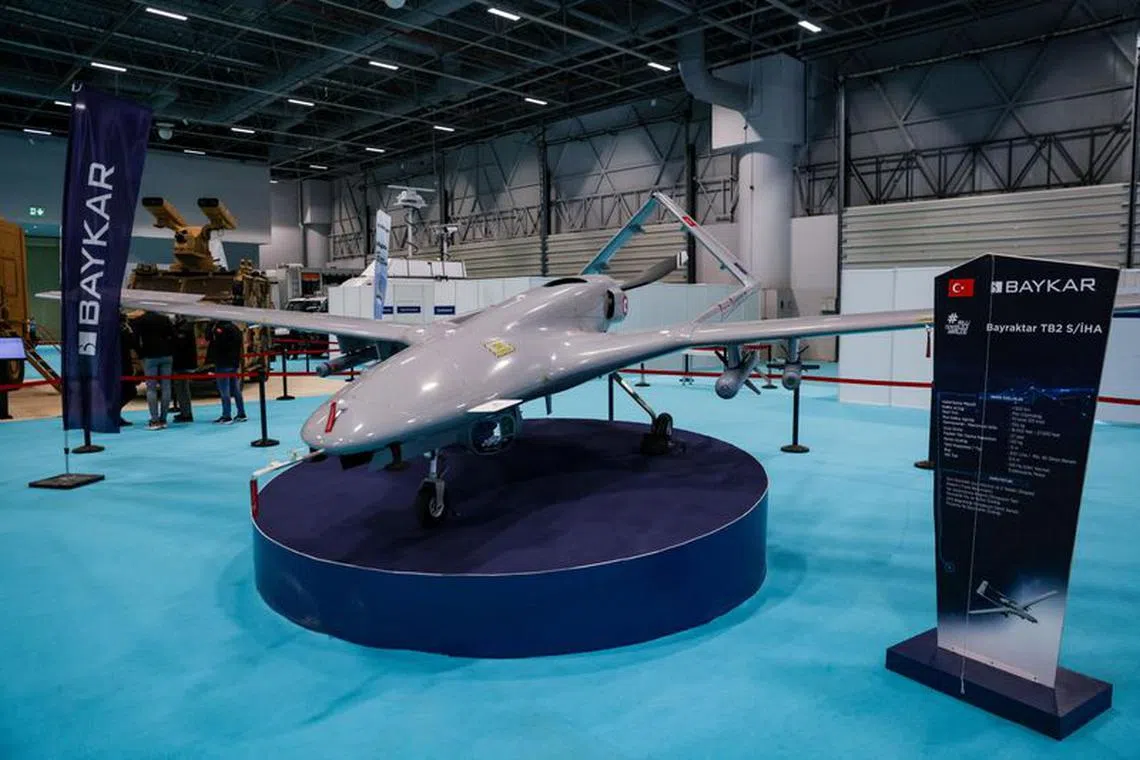 FILE PHOTO: TB2 drone of Turkish drone-maker Baykar is seen at a stand during the first day of SAHA EXPO Defence &amp; Aerospace Exhibition in Istanbul, Turkey, November 10, 2021.   To match Special Report IRAQ-TURKEY/AIRSTRIKES  REUTERS/Umit Bektas/File Photo