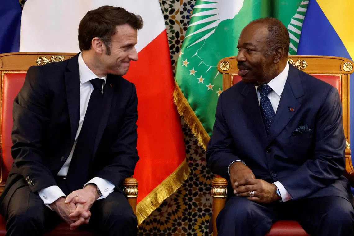 French President Emmanuel Macron (left) kicked off his Africa tour in Gabon, meeting President Ali Bongo Ondimba in Libreville, for bilateral talks.