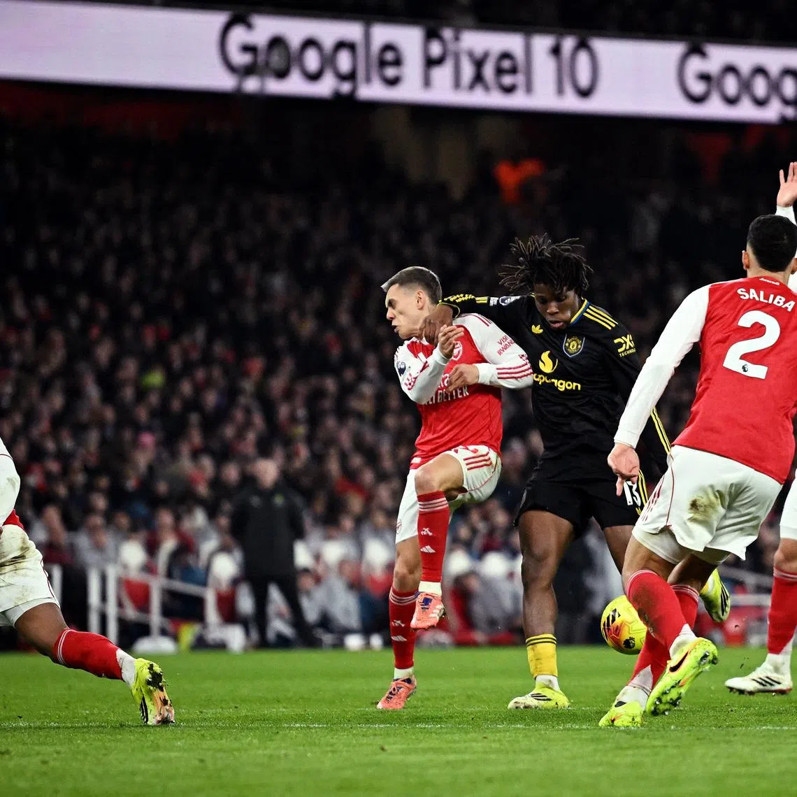 Soccer Football - Premier League - Arsenal v Manchester United - Emirates Stadium, London, Britain - January 25, 2026 Manchester United's Patrick Dorgu scores their second goal REUTERS/Dylan Martinez