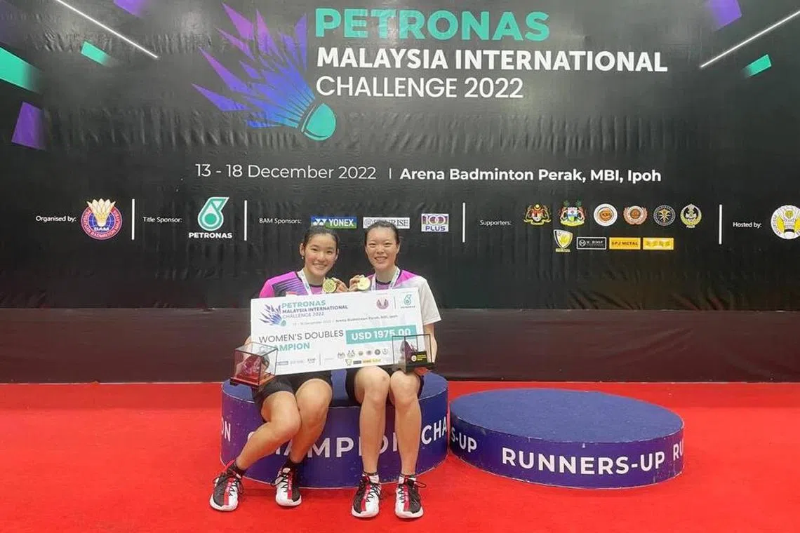 Singapore women's doubles pair Crystal Wong (left) and Jin Yujia after winning the Malaysia International Challenge.