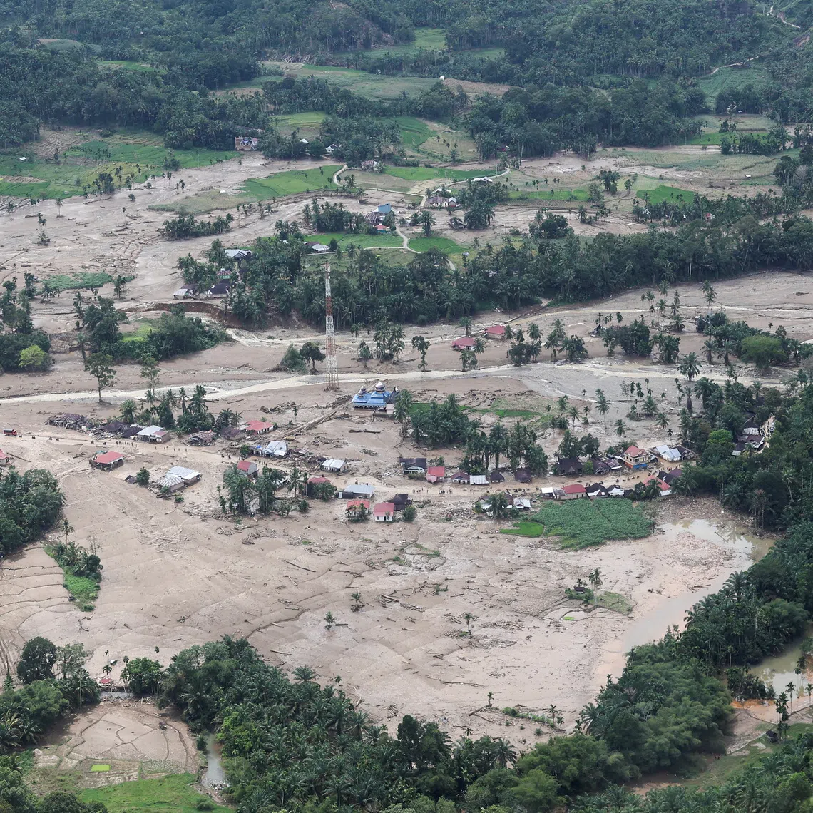 FILE PHOTO: An aerial view shows a damaged area hit by deadly flash floods in Palembayan, Agam regency, West Sumatra province, Indonesia, November 30, 2025. REUTERS/Willy Kurniawan/File Photo