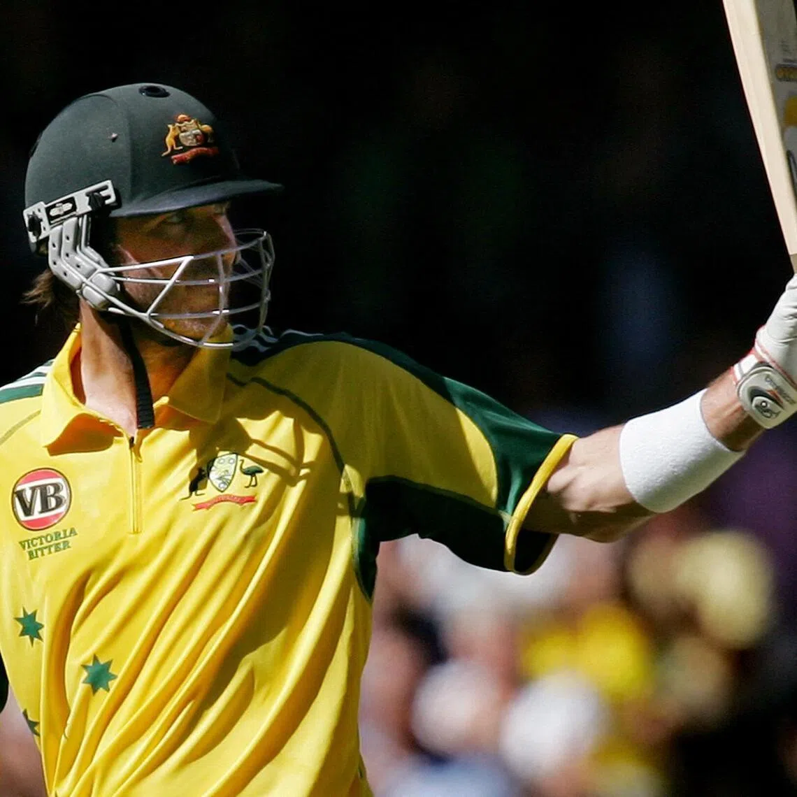 (FILES) Australian batsman Damien Martyn acknowledges the applause after scoring 50 against Sri Lanka during their one-day cricket match in Melbourne on January 13, 2006. Australian Test great Damien Martyn has woken from an induced coma following meningitis, with ex-teammate Adam Gilchrist on January 4, 2026 calling it "a miracle". The 54-year-old Martyn, who played 67 Tests between 1992 and 2006 and 208 one-day internationals, fell seriously ill late December 2025 and was rushed to hospital. (Photo by William WEST / AFP) / --IMAGE RESTRICTED TO EDITORIAL USE - STRICTLY NO COMMERCIAL USE--
