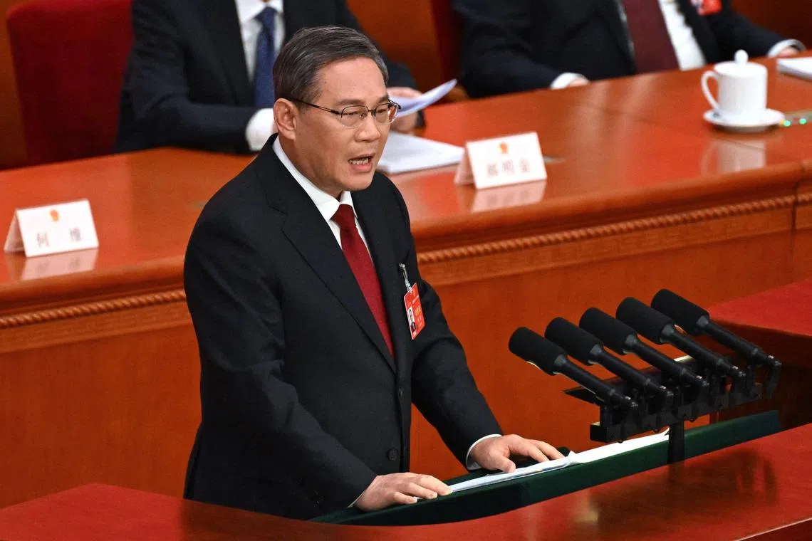 China is aiming for a growth target at around 5 per cent for the year, said Premier Li Qiang in his work report for the country, at the opening of the National People's Congress in Beijing. 