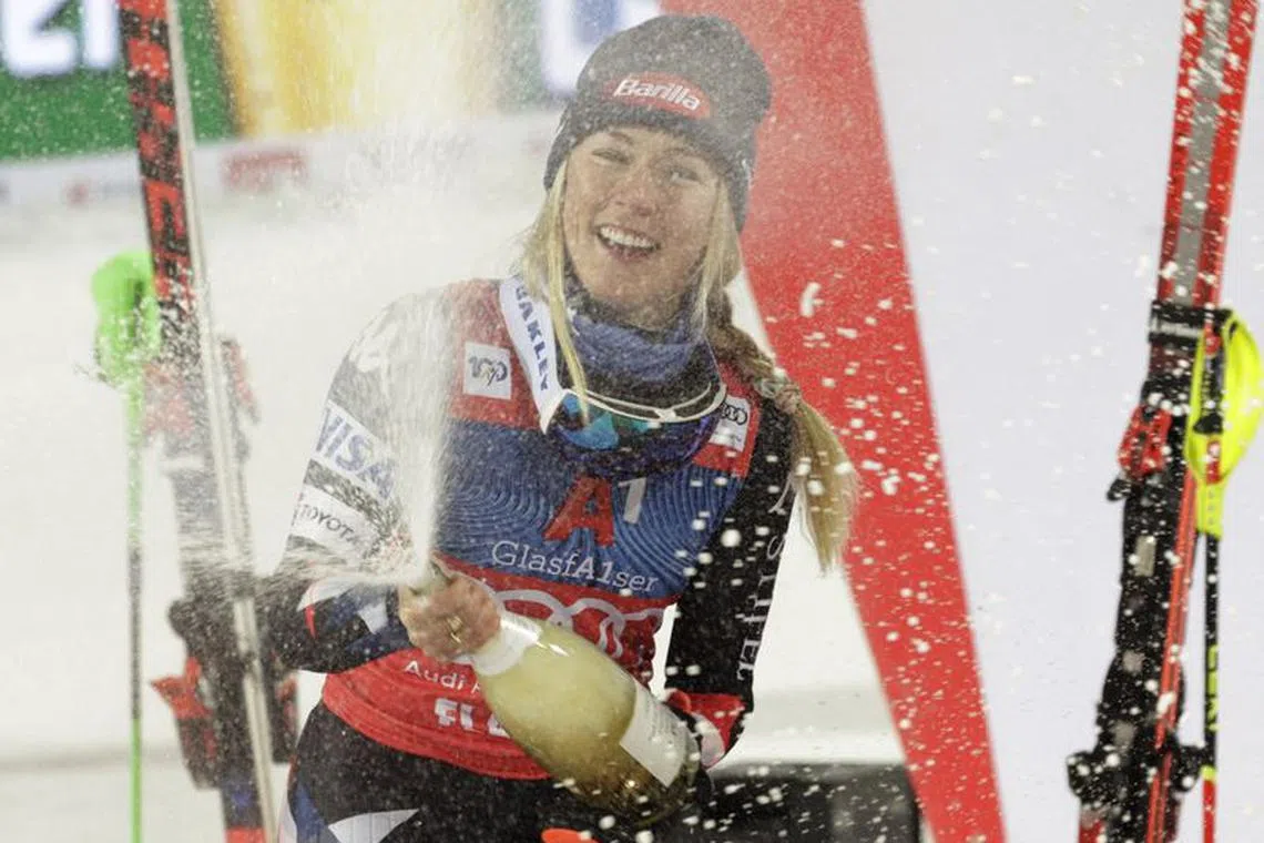 Alpine Skiing - FIS Alpine Ski World Cup - Women's Slalom - Flachau, Austria - January 16, 2024  Mikaela Shiffrin of the U.S. celebrates on the podium after winning the women's slalom REUTERS/Leonhard Foeger/File photo