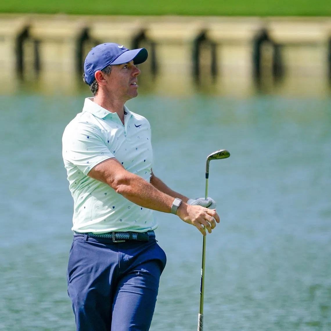 Mar 13, 2026; Ponte Vedra Beach, Florida, USA; Rory McIlroy watches his approach shot to the 18th hole during the second round of THE PLAYERS Championship golf tournament. Mandatory Credit: Jeff Romance-Imagn Images