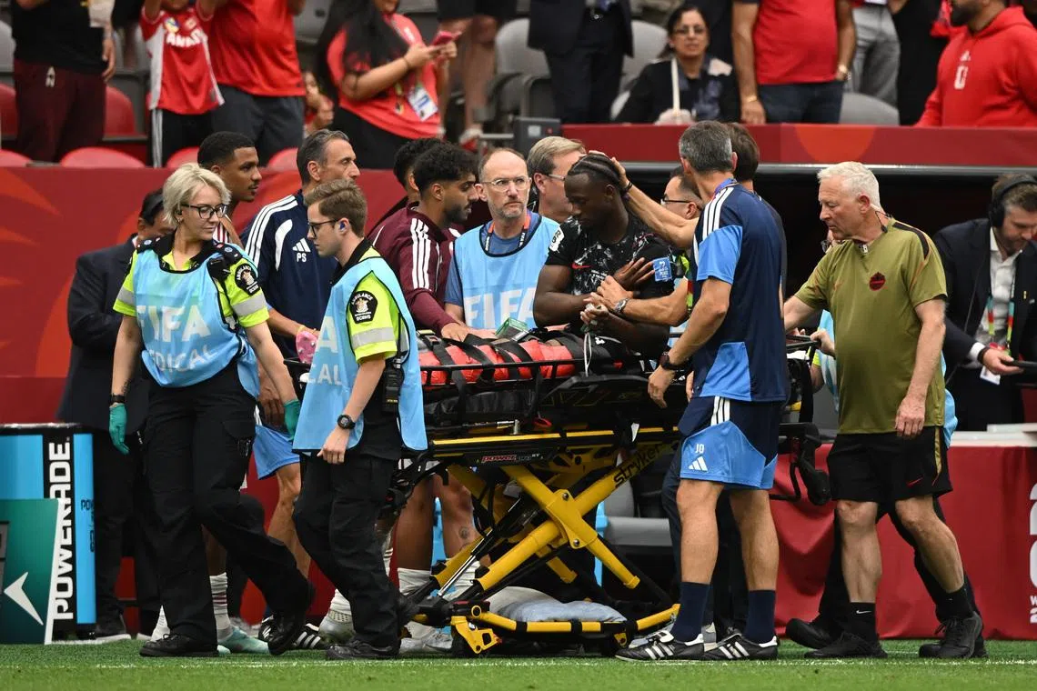Jun 18, 2026; Vancouver, British Columbia, USA; Canada midfielder Ismael Kone (8) leaves the pitch on a stretcher after sustaining an injury during the second half against Qatar during a Group B match in the 2026 FIFA World Cup at BC Place Vancouver. Mandatory Credit: Anne-Marie Sorvin-Imagn Images