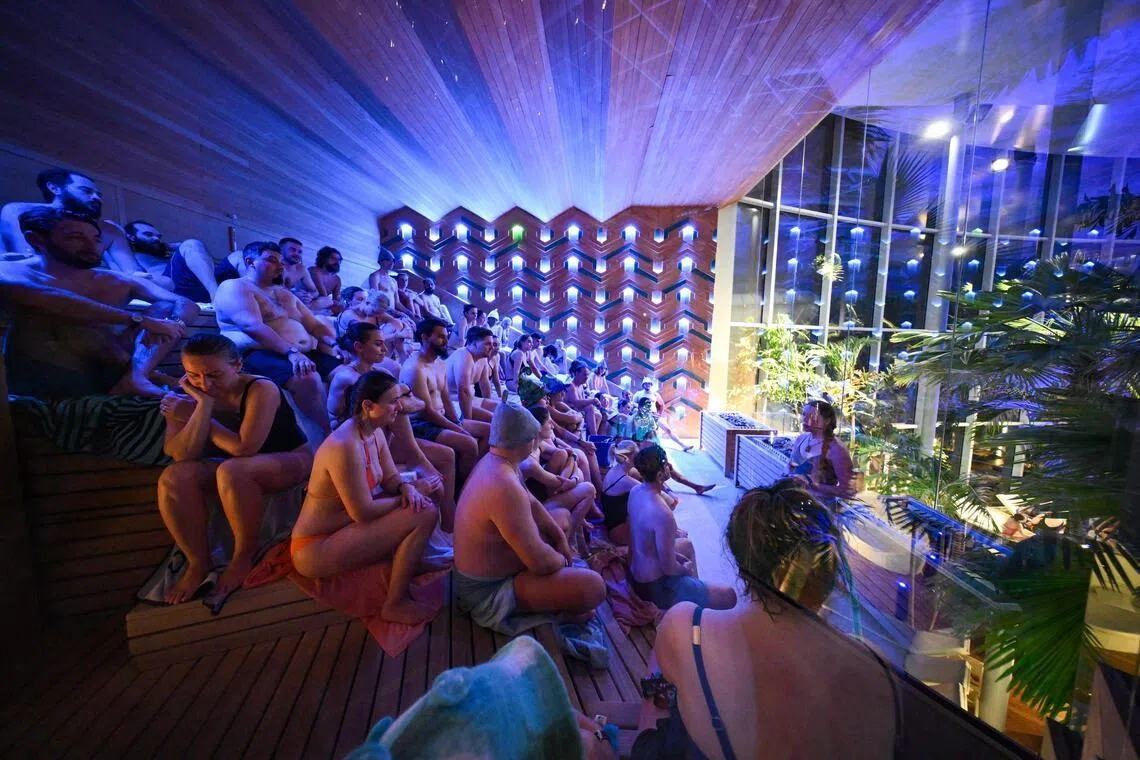 Visitors at the Amazon Sauna which can be heated up to 70 deg C.