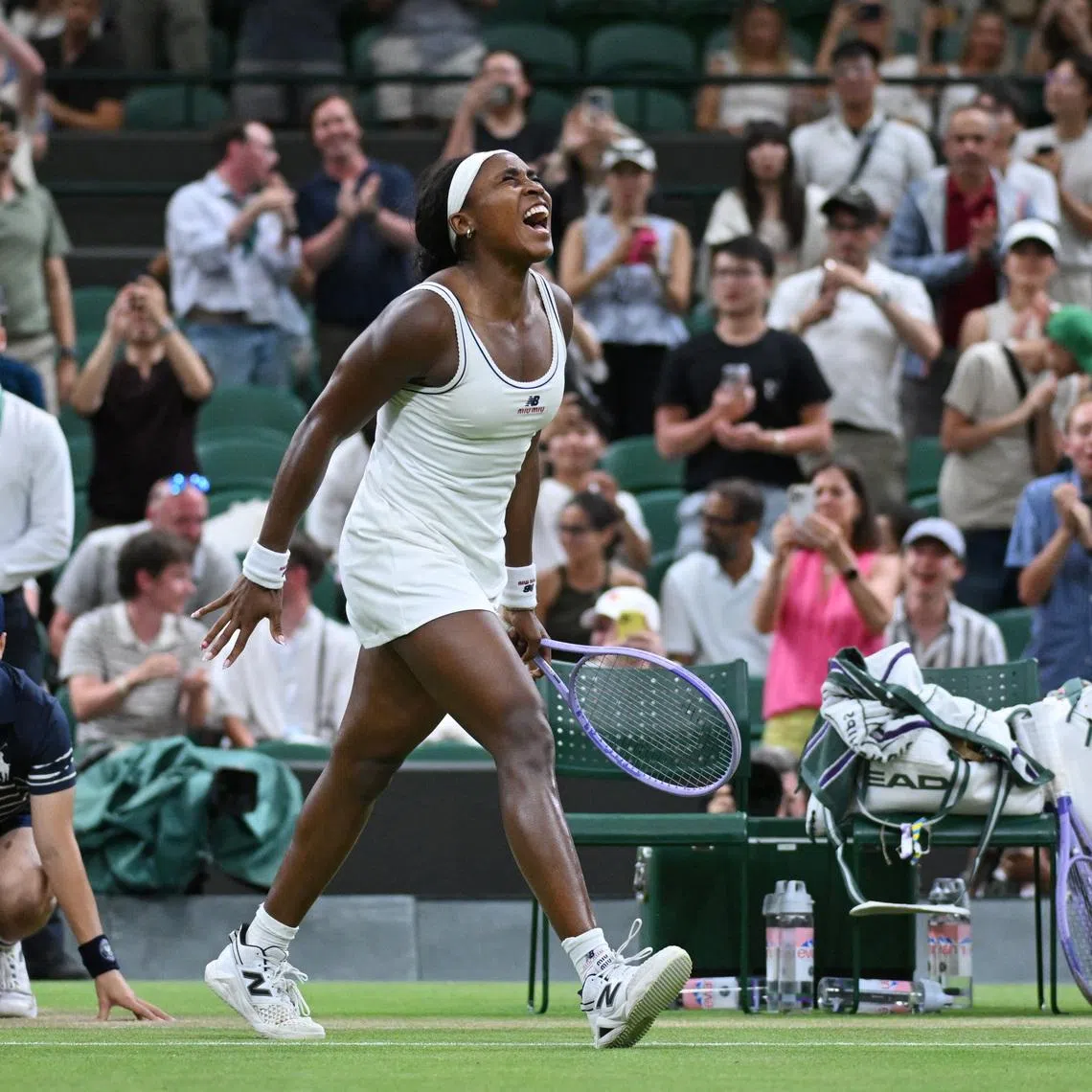 Coco Gauff celebrates after winning her fourth round match against Switzerland’s Belinda Bencic.