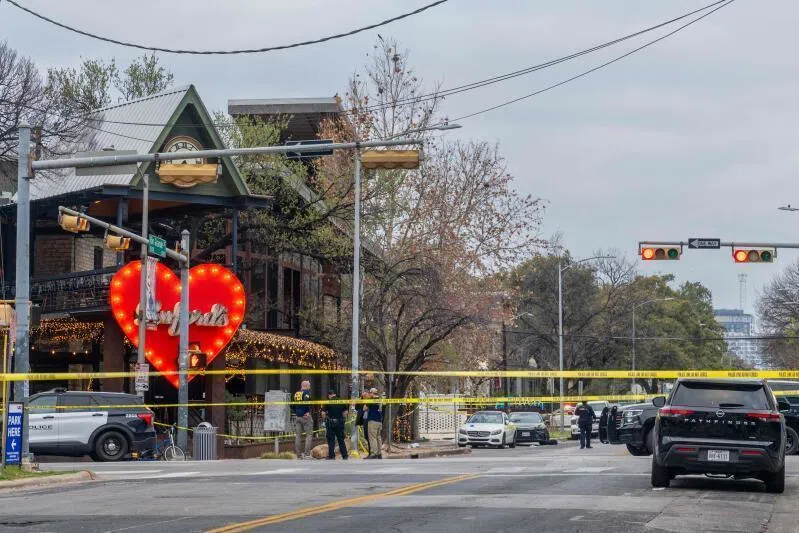 Members of the FBI and local law enforcement investigate after a mass shooting outside of Buford's bar in downtown on March 01, 2026 in Austin, Texas.