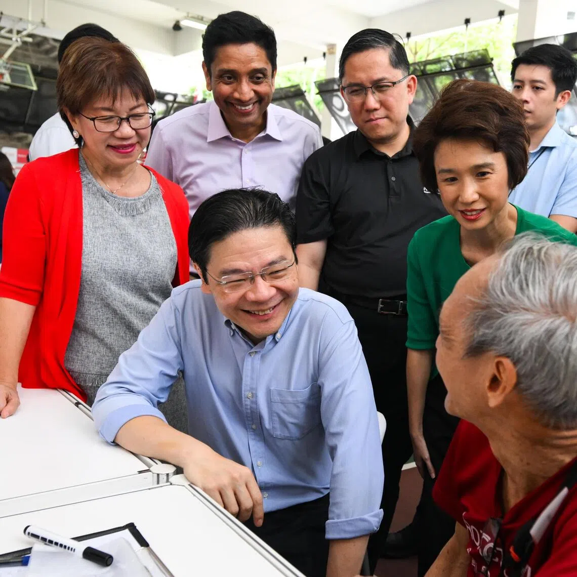 Prime Minister Lawrence Wong said that both national policies and community-level initiatives are needed to support the training and job needs of Singaporeans.