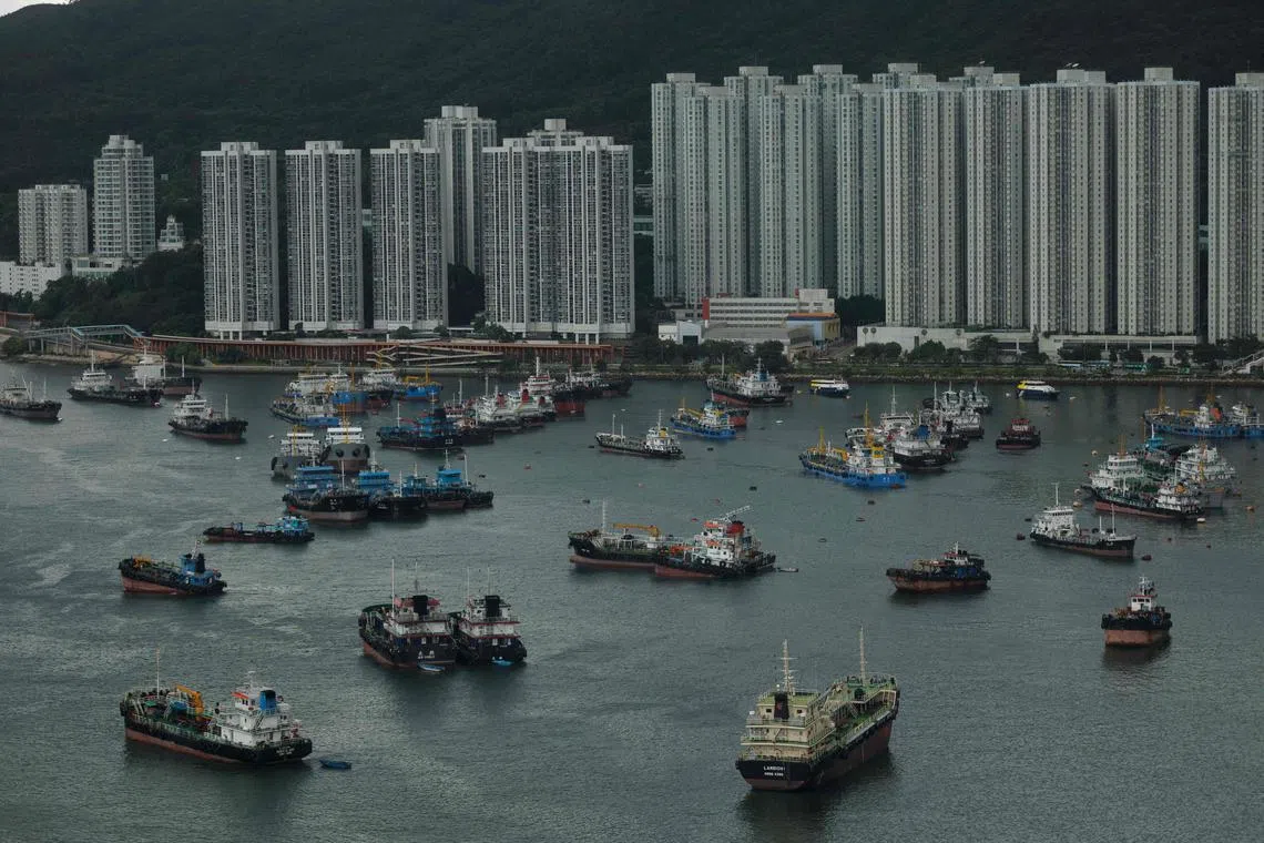 Boats are moored at a typhoon shelter in Tseun Wan as a precaution for the approaching Typhoon Talim in Hong Kong.