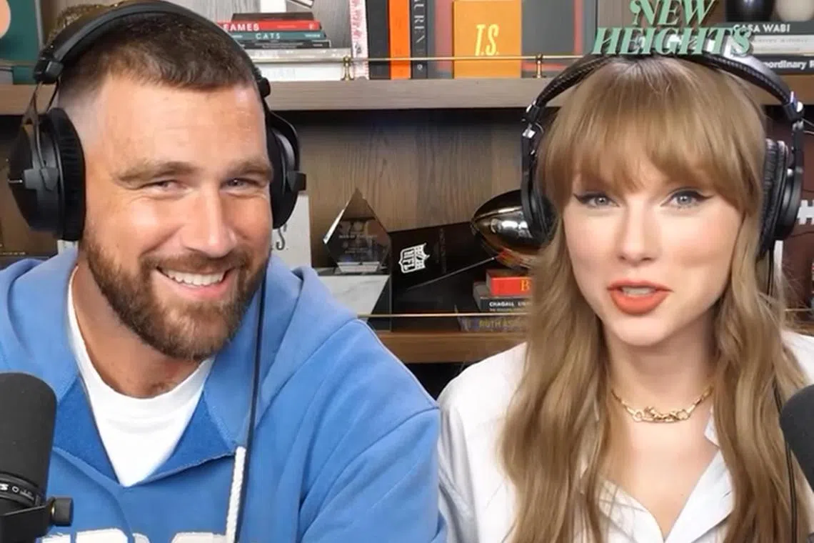 Taylor Swift's appearance on New Heights was confirmed when the podcast’s social feeds posted a short snippet revealing Swift sitting alongside Travis Kelce. 