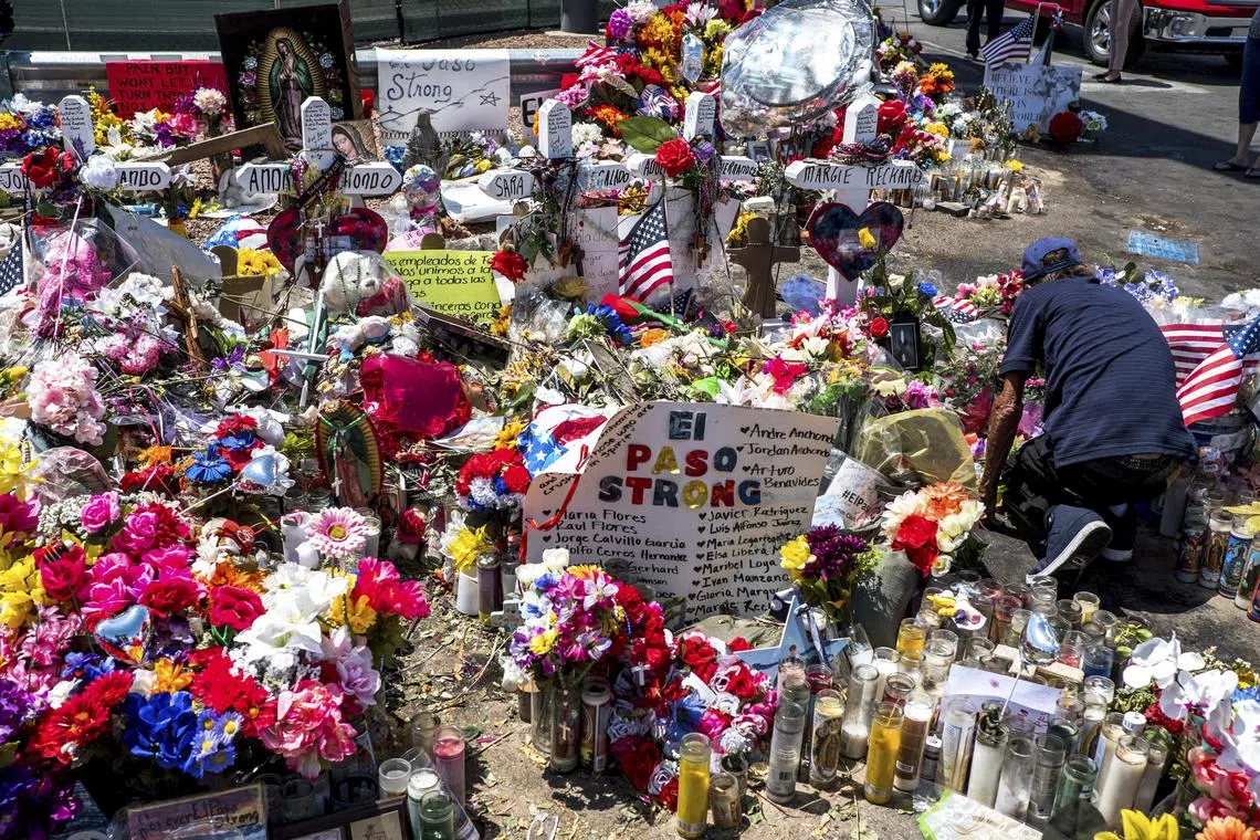 Tributes for the victims of a mass shooting at a Walmart store in Texas in 2019.