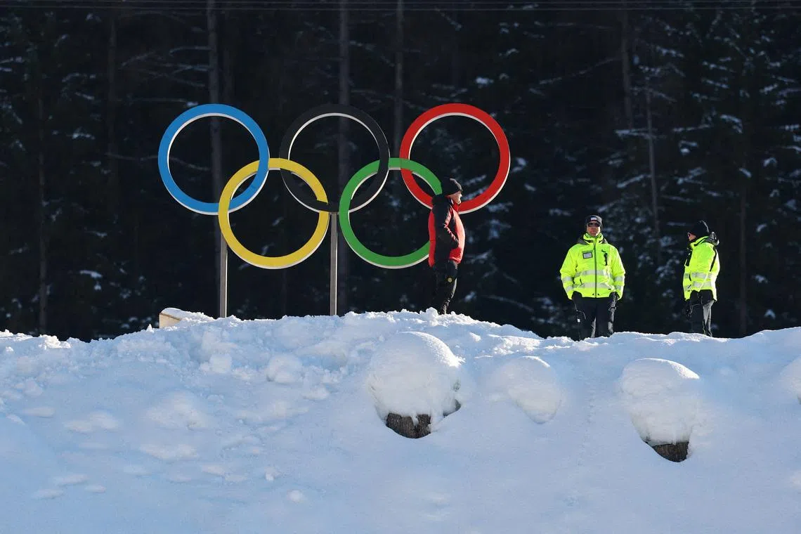 FILE PHOTO: Milano Cortina 2026 Winter Olympics - Cross-Country Skiing - Tesero Cross-Country Skiing Stadium, Lago, Italy - February 3, 2026 General view of the Olympic rings and security REUTERS/Kai Pfaffenbach/File Photo