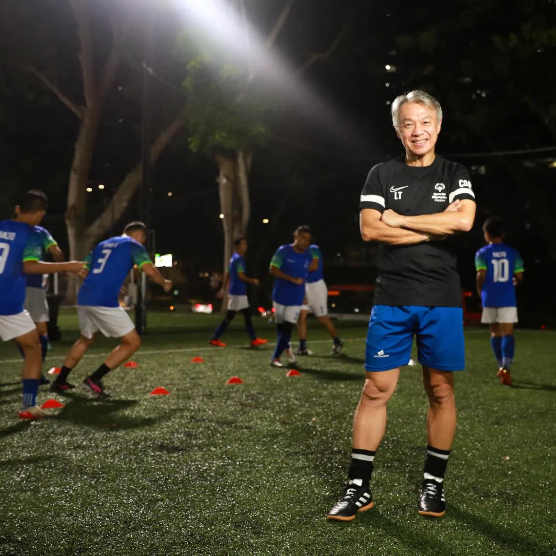 ST20230517_202391184081/smsport/Ryan Chiong

Volunteer coach Lionel Teo and the Special Olympics football team at a friendly match against East Coast United FC, held at the Shelton International College futsal pitch on May 17, 2023.

Come June, the team will be heading for the Special Olympics World Games, held in Berlin.