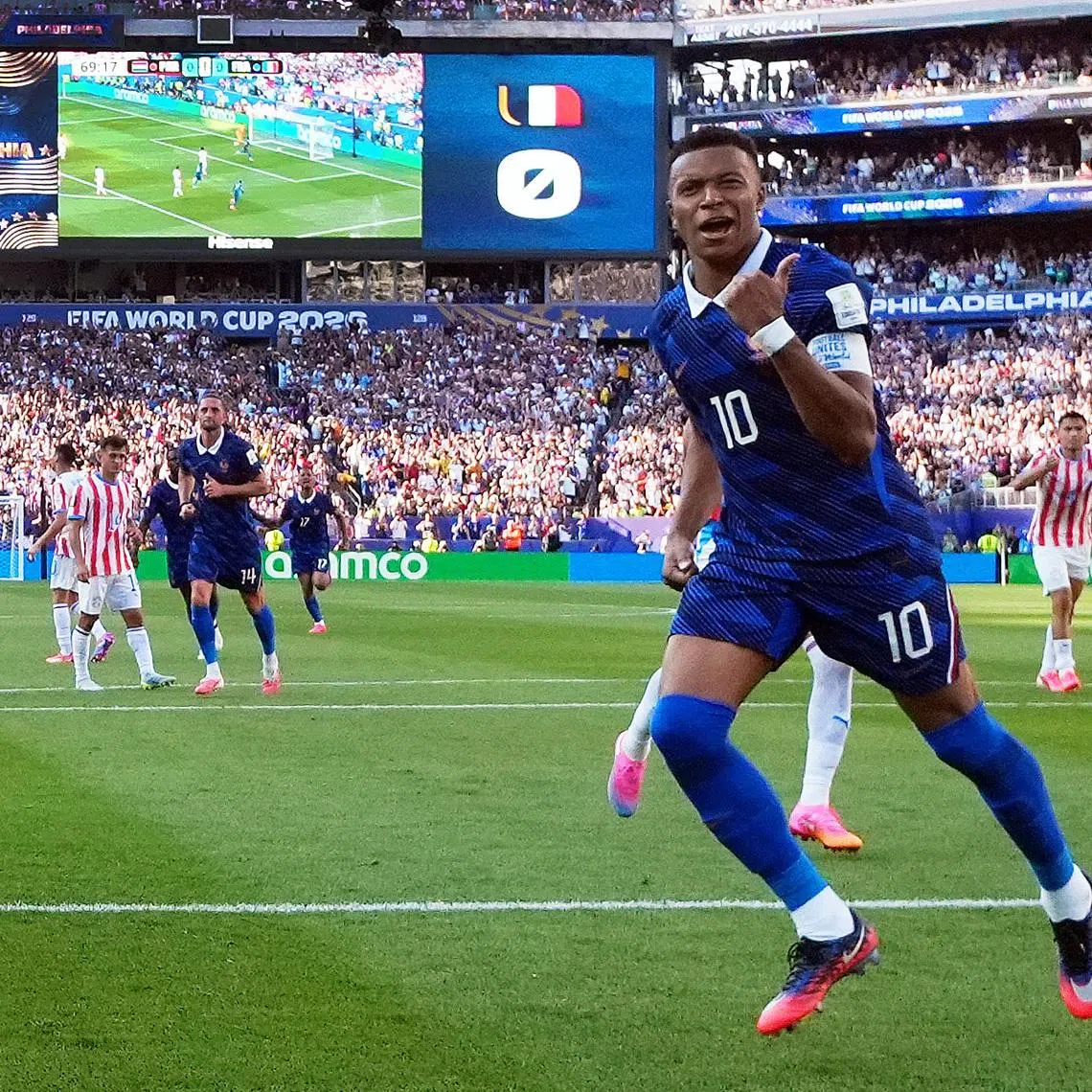 France’s Kylian Mbappe celebrates scoring against Paraguay.