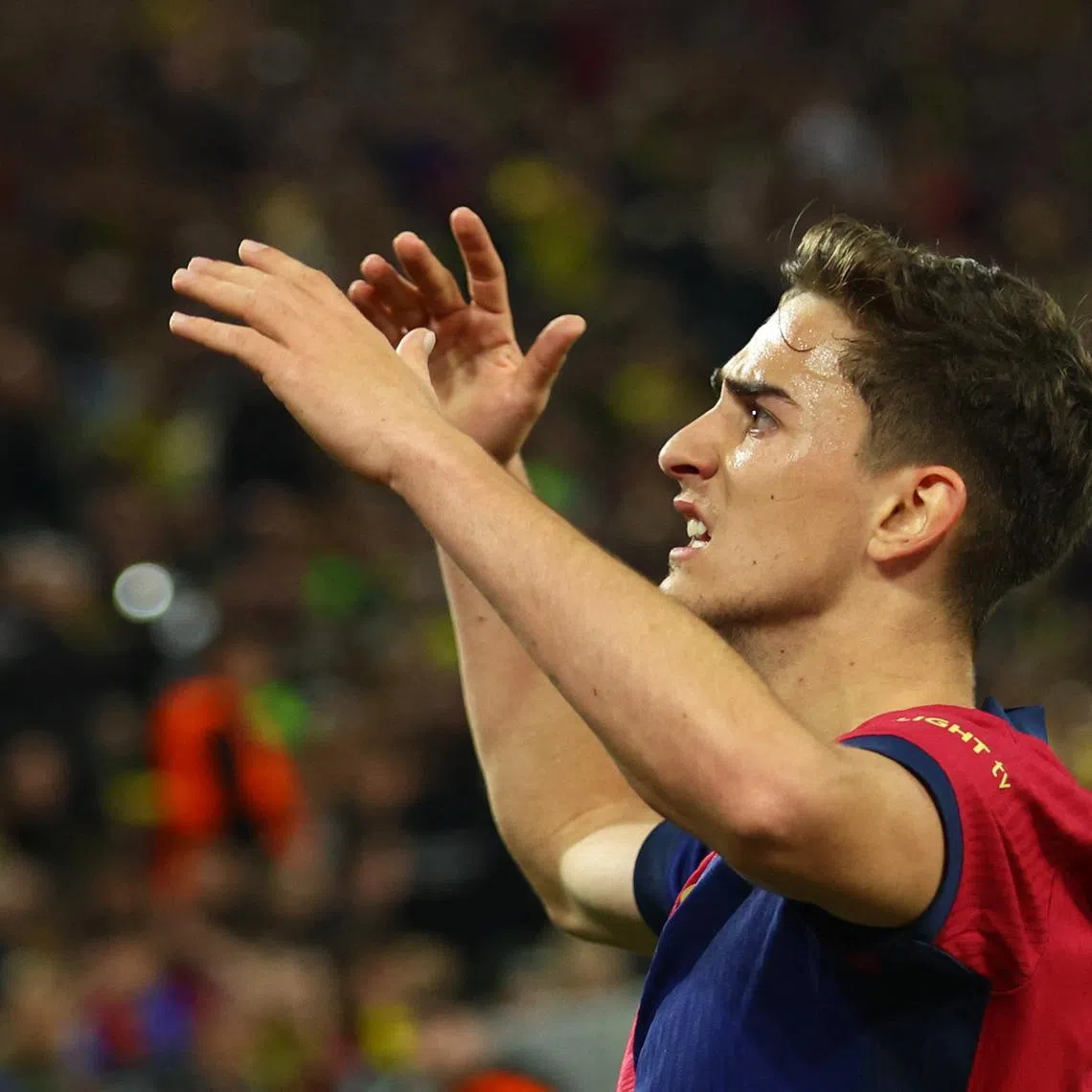 Soccer Football - Champions League - Quarter Final - Second Leg - Borussia Dortmund v FC Barcelona - Signal Iduna Park, Dortmund, Germany - April 15, 2025 FC Barcelona's Gavi celebrates their first goal, an own goal scored by Borussia Dortmund's Ramy Bensebaini REUTERS/Thilo Schmuelgen/File Photo