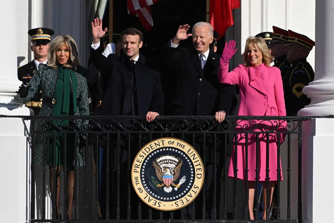 US President Joe Biden and First Lady Jill Biden (both right) welcome French President Emmanuel Macron and his wife Brigitte Macron to the White House.