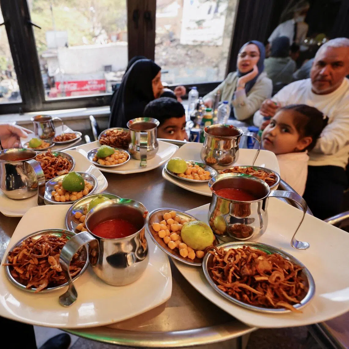 Egypt's budget-friendly, carb-loaded bowl of noodles, rice, lentils and fried onions doused in a blazing hot sauce is a culinary staple.