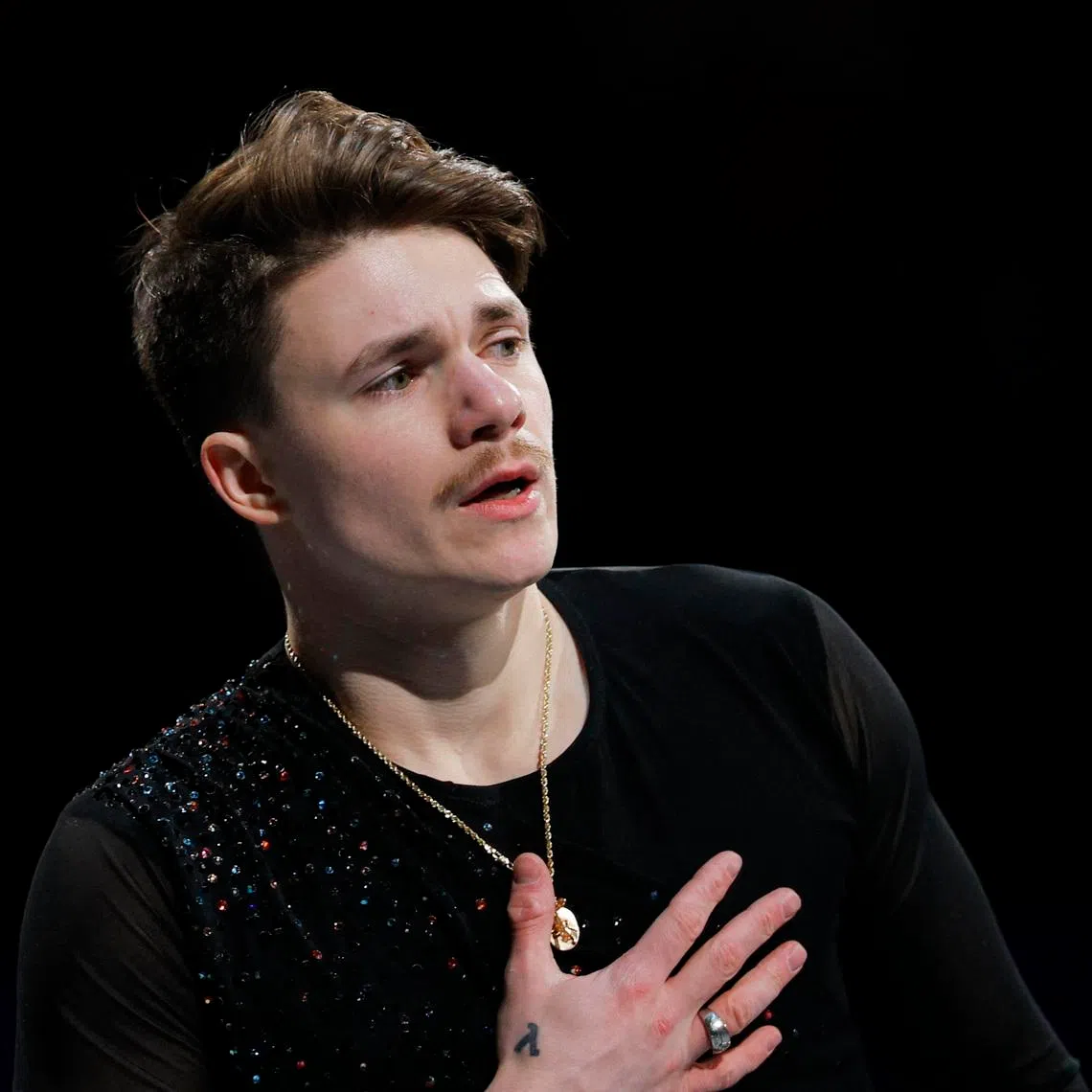 Figure Skating - ISU World Championships - TD Garden, Boston, Massachusetts, U.S. - March 30, 2025 Maxim Naumov of the U.S., a guest skater who's parents died in the Washington DC plane accident on January 29, 2025, performs during the exhibition gala REUTERS/Brian Snyder