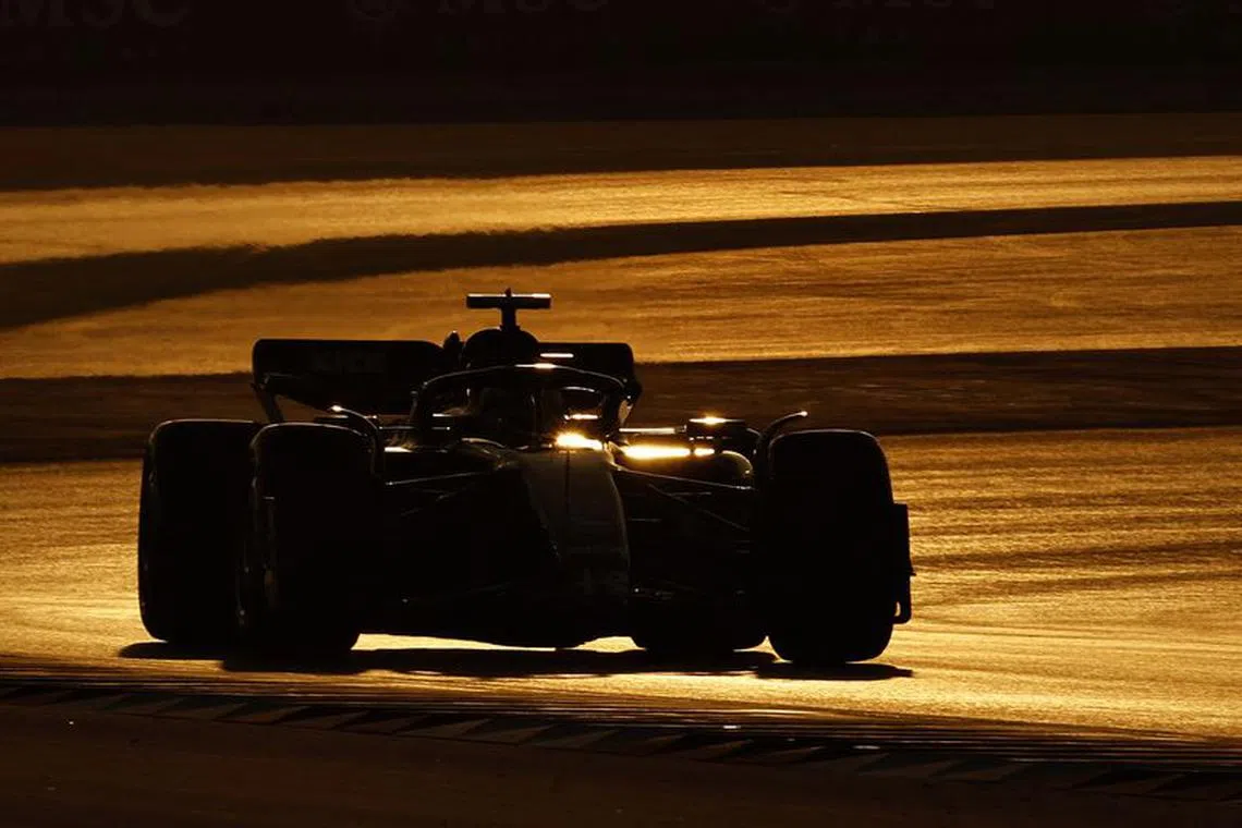 FILE PHOTO:Formula One F1 - Qatar Grand Prix - Lusail International Circuit, Lusail, Qatar - October 7, 2023 General view of a silhouette of a car in action during the sprint shootout REUTERS/Hamad I Mohammed/File Photo