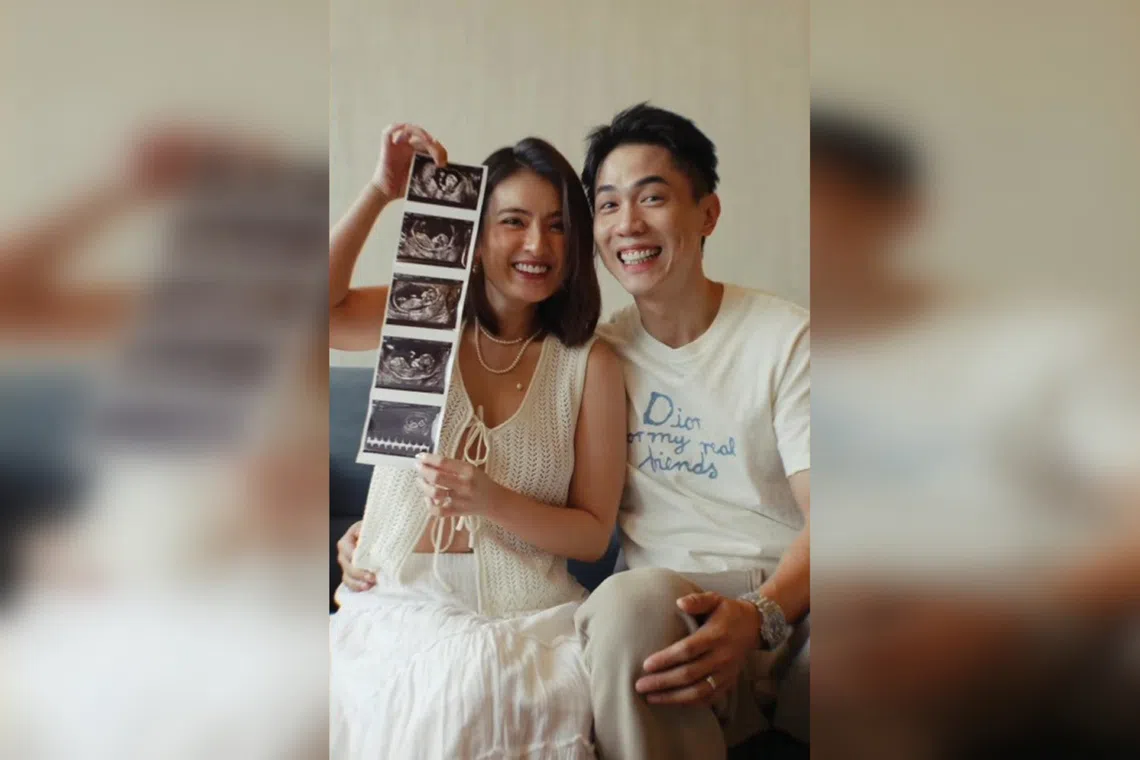 Singaporean actress Hong Ling (left) showing a series of ultrasound images with her husband, Singaporean actor Nick Teo (right).