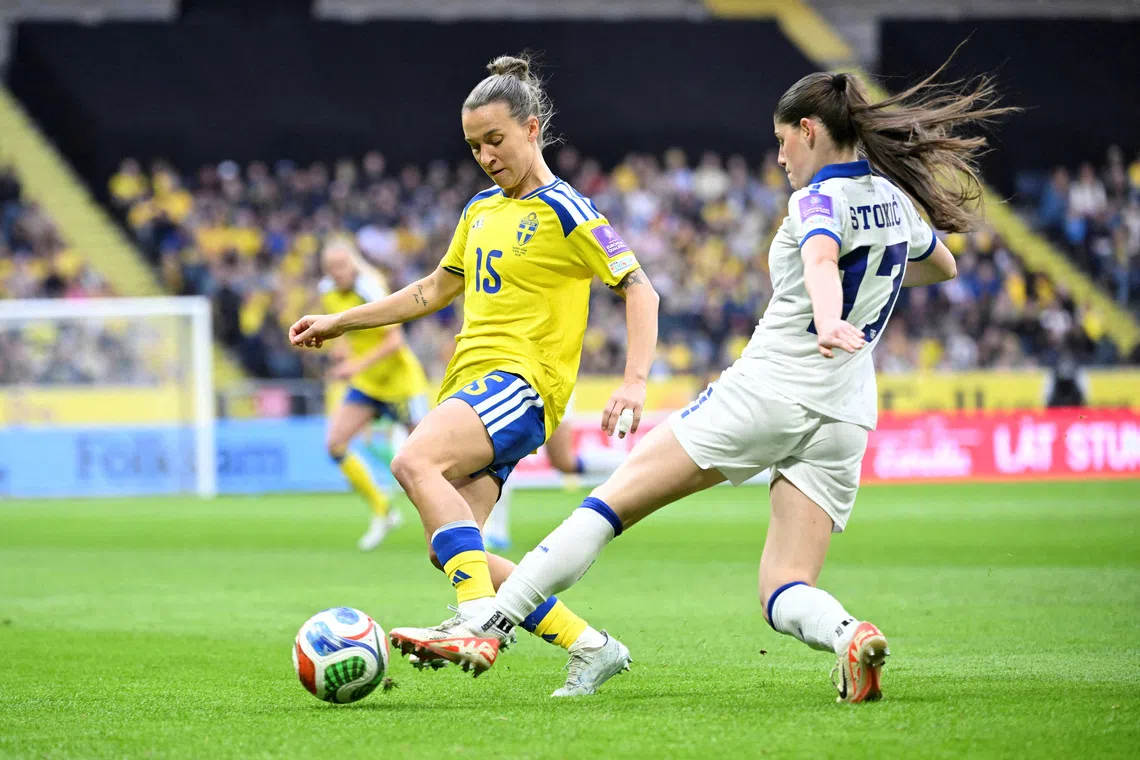 FILE PHOTO: Soccer Football - Women's World Cup - European Qualifiers - Sweden v Serbia - Strawberry Arena, Solna, Sweden - April 18, 2026 Sweden's Julia Zigiotti Olme in action with Serbia's Sara Stokic  Jessica Gow/TT News Agency via REUTERS