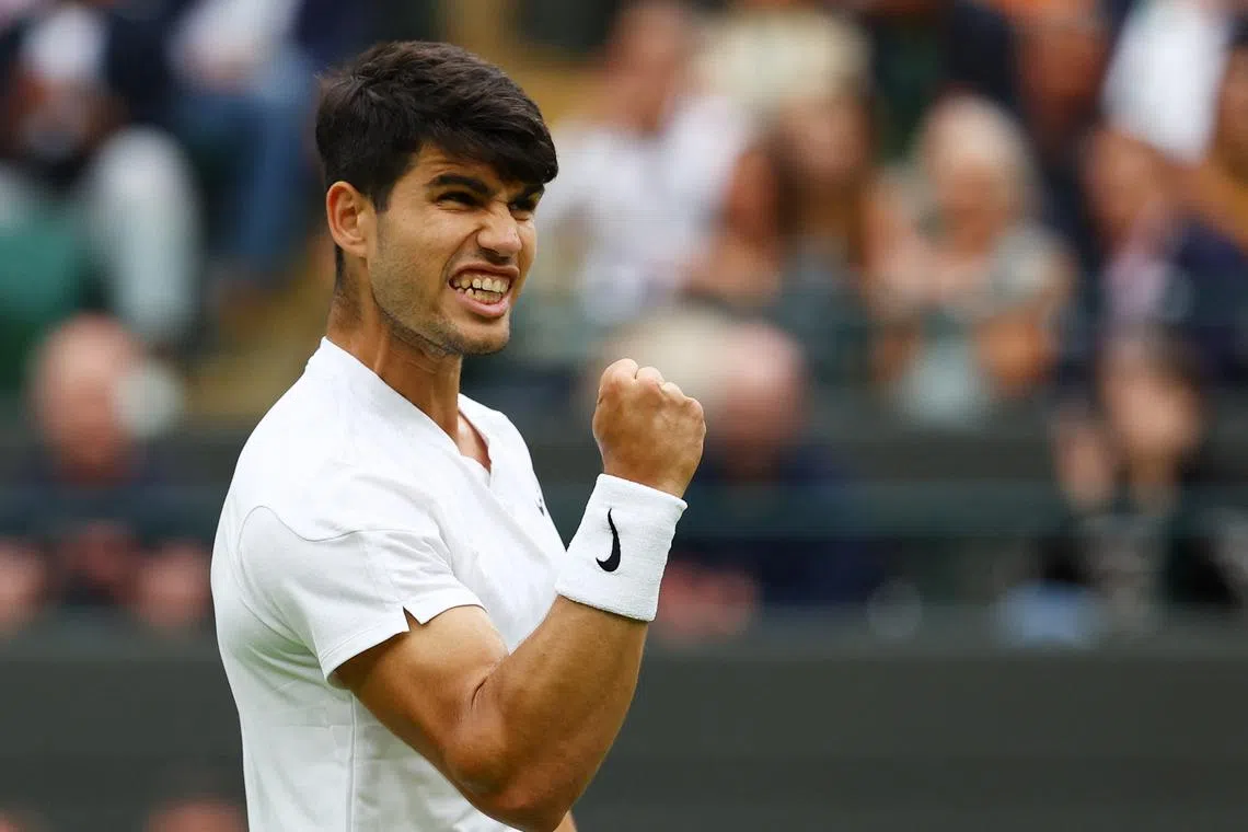 Tennis - Wimbledon - All England Lawn Tennis and Croquet Club, London, Britain - July 3, 2024 Spain's Carlos Alcaraz reacts during his second round match against Australia's Aleksandar Vukic REUTERS/Matthew Childs