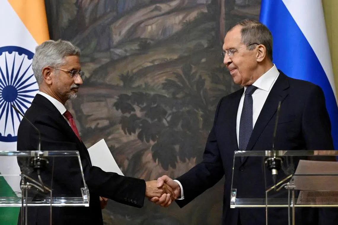 FILE PHOTO: Russia's Foreign Minister Sergei Lavrov shakes hands with India's Foreign Minister Subrahmanyam Jaishankar during a joint press conference following their talks in Moscow, Russia December 27, 2023. Alexander Nemenov/Pool via REUTERS/File Photo